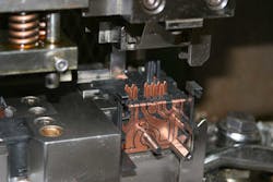 Acromatic Plastics makes a variety of parts for the automotive industry. This mold is for contact units. Acromatic Plastics makes a variety of parts for the automotive industry. This mold is for contact units.