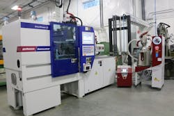 This integrated work cell has a beside-the-press Aton segmented dryer from Wittmann Battenfeld. This integrated work cell has a beside-the-press Aton segmented dryer from Wittmann Battenfeld.