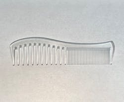 Bennett Plastics uses 3-D stereolithography, or SLA, printers to help its customers optimize their products, like this comb. Bennett Plastics uses 3-D stereolithography, or SLA, printers to help its customers optimize their products, like this comb.