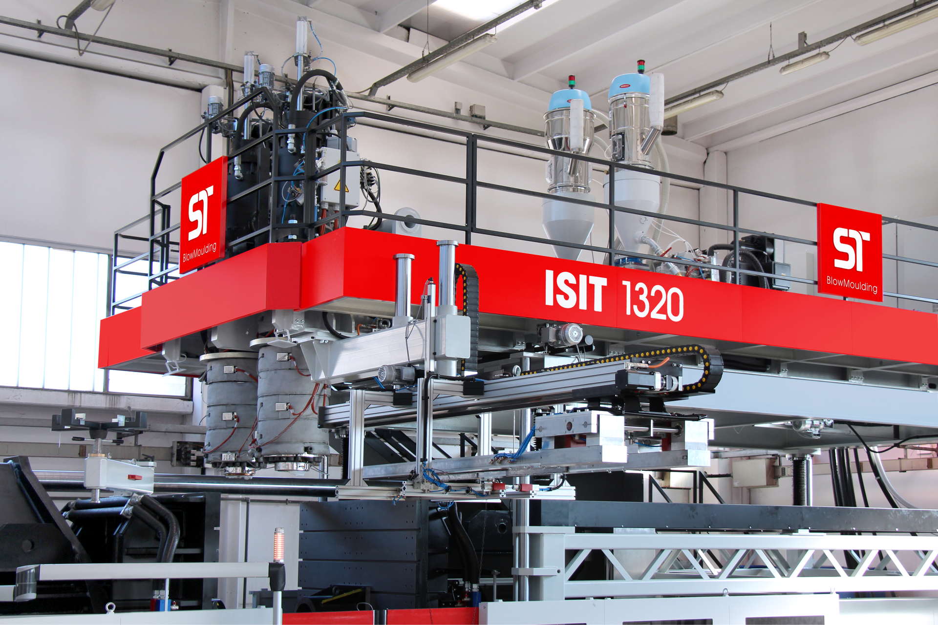 The ISIT 1320 Dual Head extrusion blow molding machine