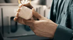 InnovatiQ's new dual-extruder TiQ 5 3-D printer can print two components at once and handle a range of resins, including ABS, PP and engineering-grade resins.