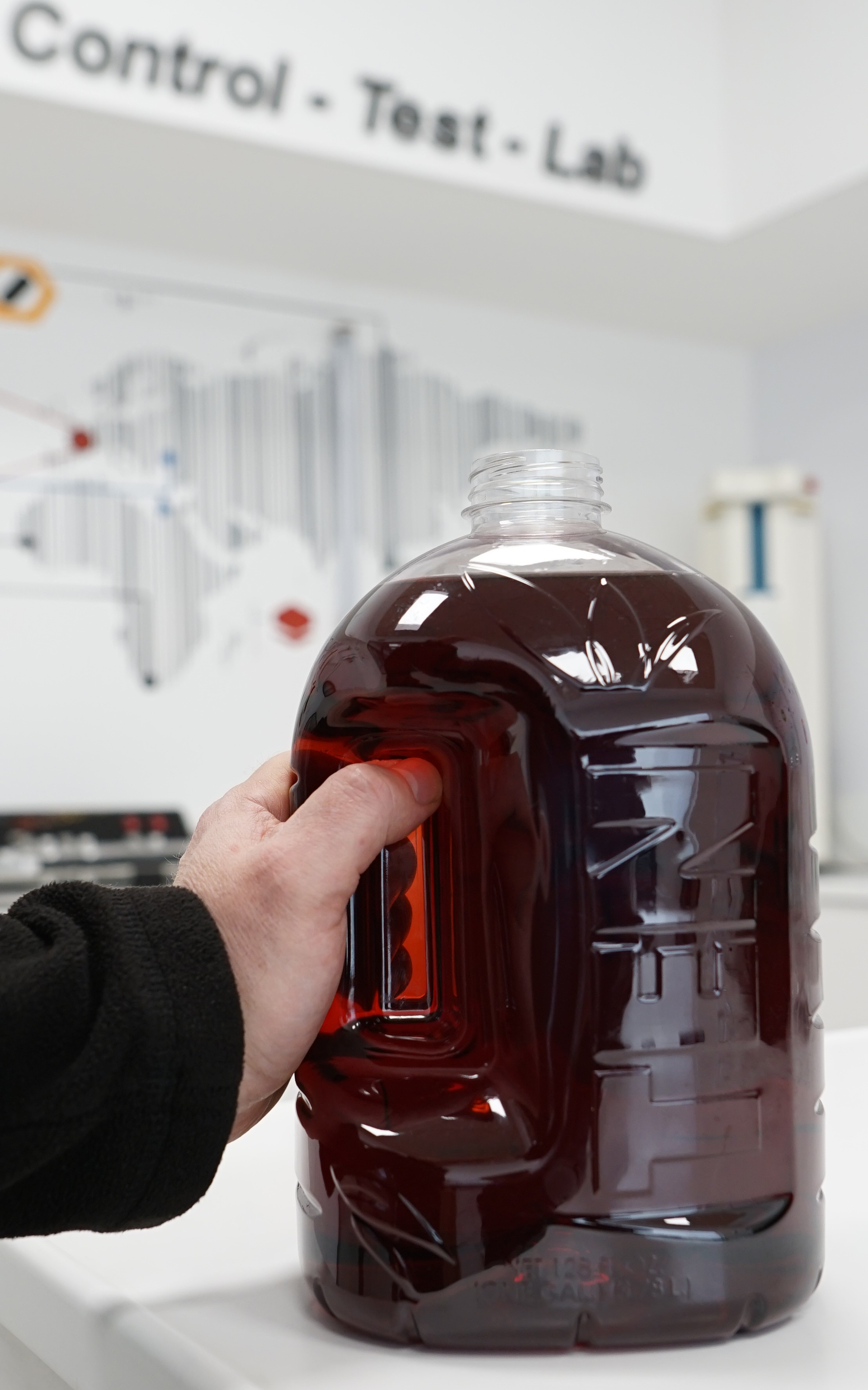 This 1-gallon PET Sure Grip bottle is 100 percent recyclable.