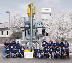 Maag Reduction employees stand near the 1,000th pulverizer produced at their facility in Kent, Ohio. Maag Reduction employees stand near the 1,000th pulverizer produced at their facility in Kent, Ohio.