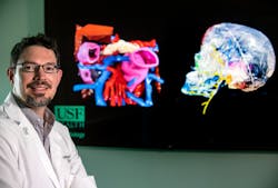 Jonathan Ford is one of two full-time employees at the USF Health 3-D printing lab, and during the first 200 days that they worked to produce nasal swabs, he said they only went home to shower. With help from occasional volunteers, they were able to print 100,000 swabs. Jonathan Ford is one of two full-time employees at the USF Health 3-D printing lab, and during the first 200 days that they worked to produce nasal swabs, he said they only went home to shower. With help from occasional volunteers, they were able to print 100,000 swabs.