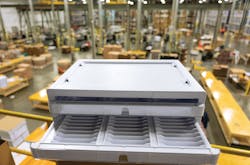 Elevate's sample kits include shelving systems with slots for contact lens samples. Elevate's sample kits include shelving systems with slots for contact lens samples.