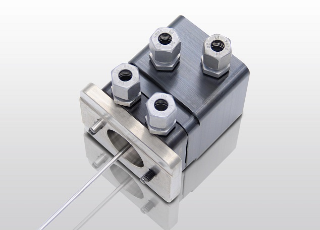Designed primarily for fully wired and piped hot-runner systems, Hasco's 107940 needle-valve unit comes in a compact housing that contains a piston and connections.