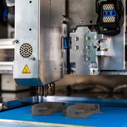 The CEM E2 extruder can print with standard resin pellets, which lets it print faster and more economically than using filament.