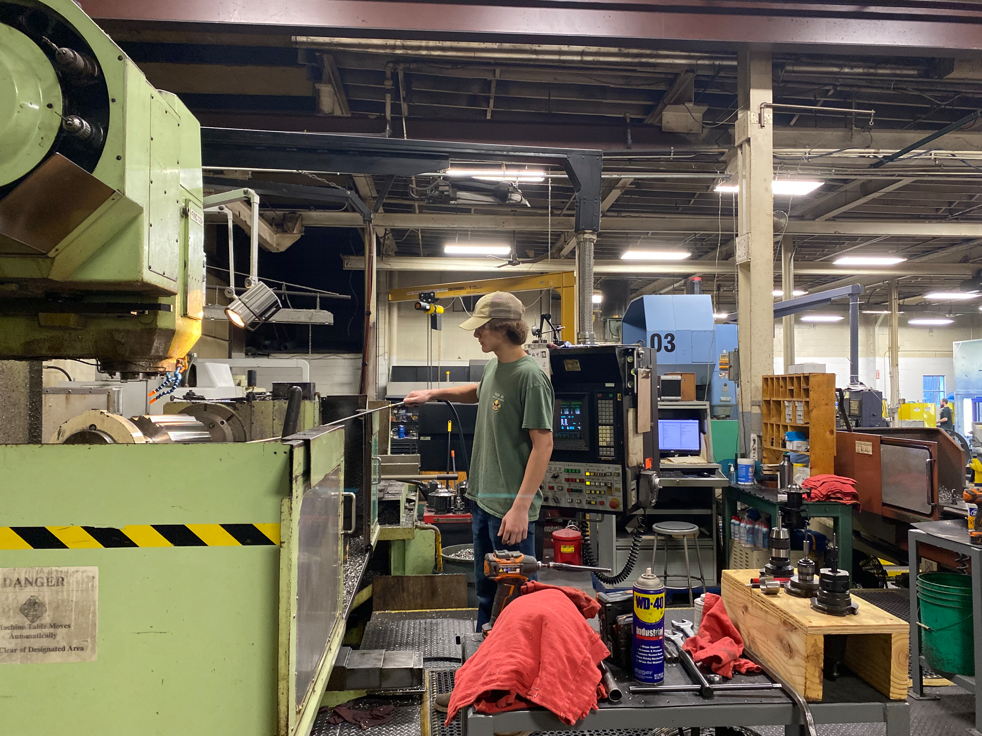 High school senior Wyatt Bossbach says he's always enjoyed working with his hands, making him an ideal fit as an apprentice at Bay Plastics Machinery.