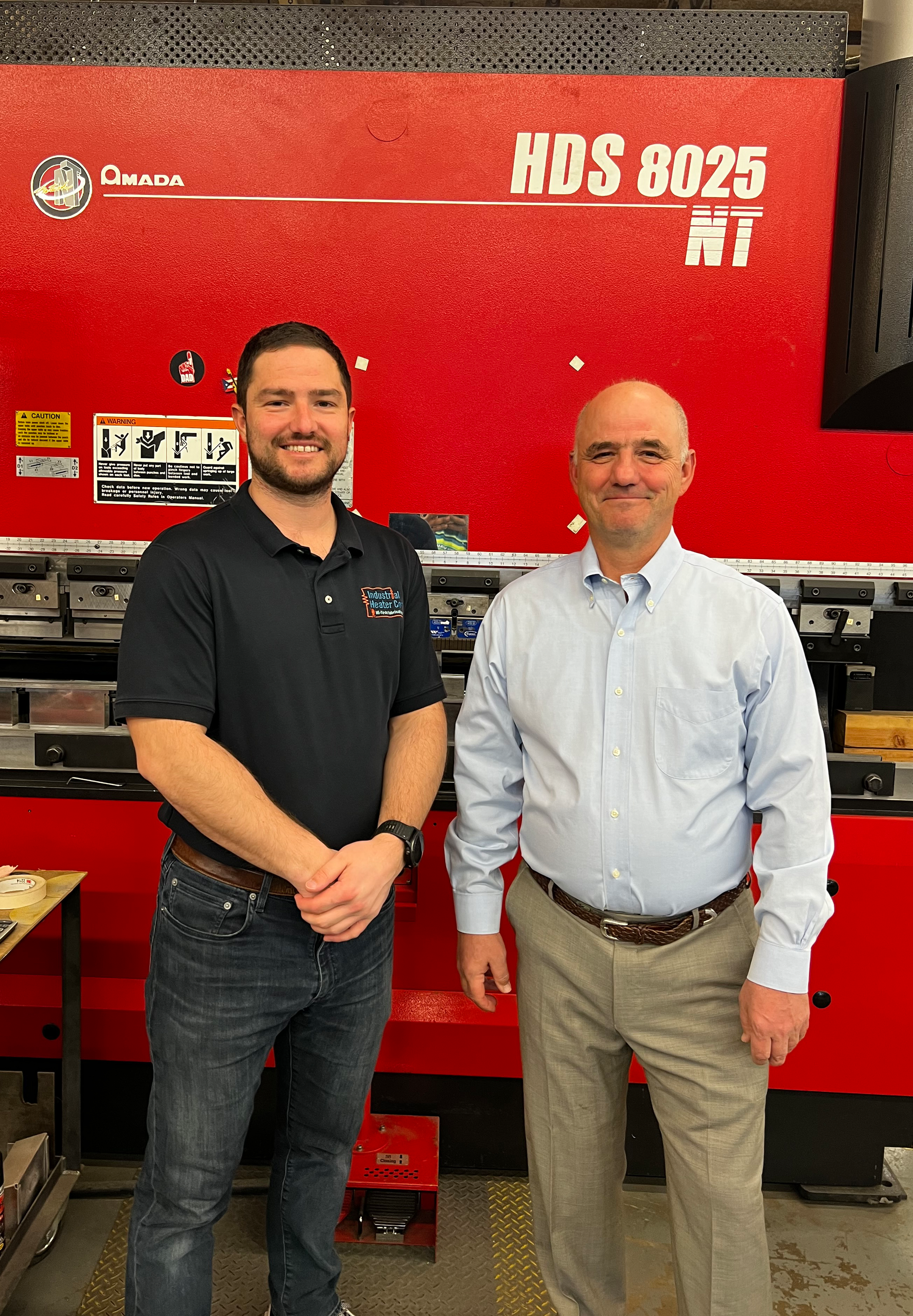 Tad McGwire, right, is CEO and owner of Industrial Heater Corp., as well as serving as chairman of the Plastics Industry Association (PLASTICS). Here, he stands next to his oldest son, Tom.