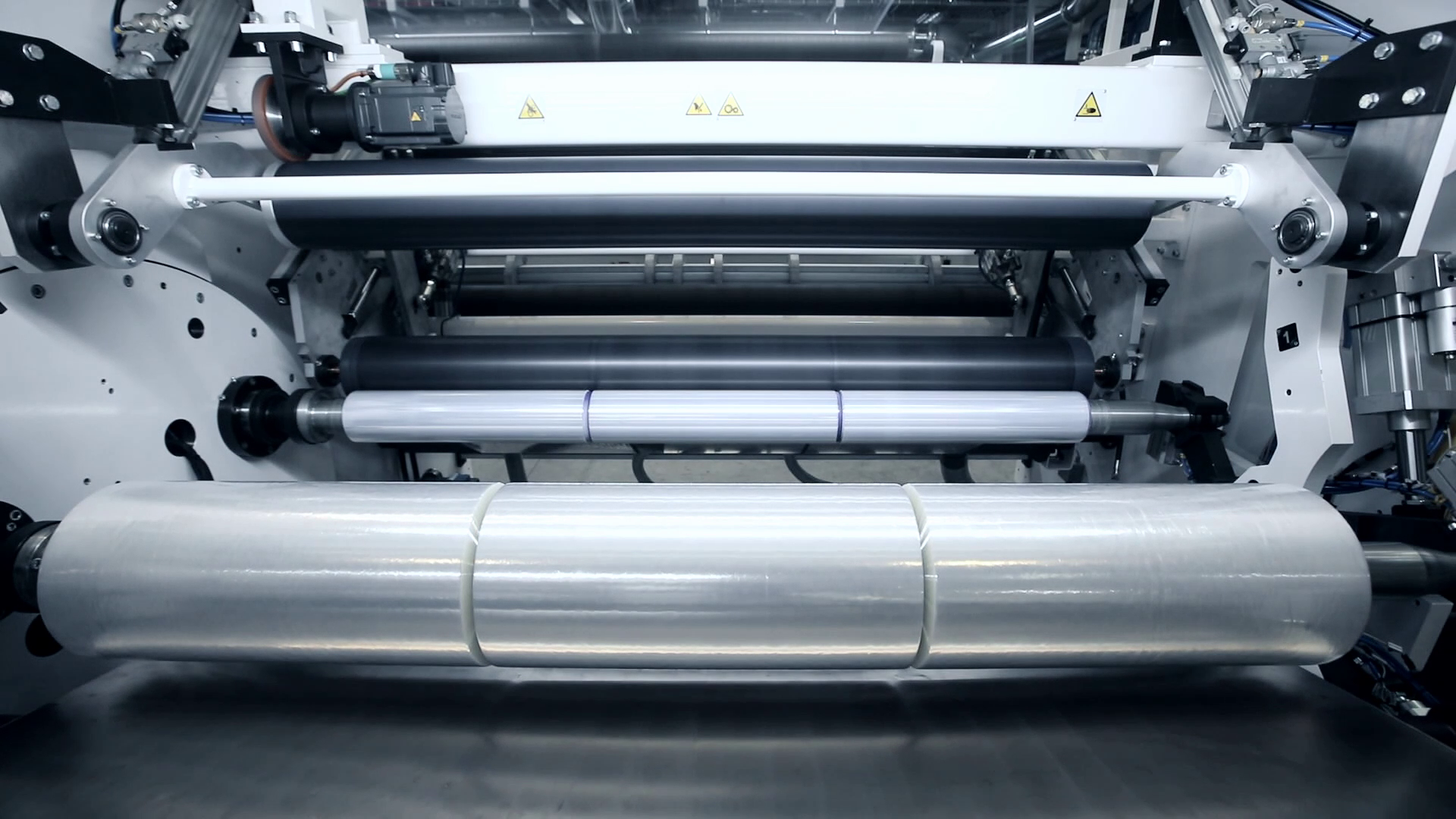 Rolls of cast film on a Colines winder