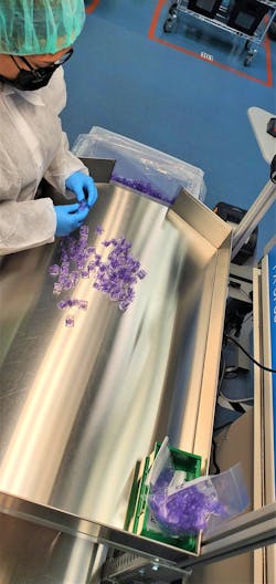 A Westfall Technik worker looks over parts at the company's newest medical molding facility, near Chicago. A Westfall Technik worker looks over parts at the company's newest medical molding facility, near Chicago.