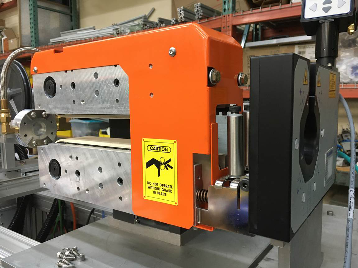 This Versa C-44 caterpillar puller features a 4-inch opening and 4-inch-wide belt. Its pneumatic opening feature allows the system to be automated.