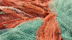 Two companies are turning reclaimed fishing nets into new materials.