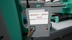 A screen shot from a virtual reality scenario shows a simulated worker operating an injection molding machine.