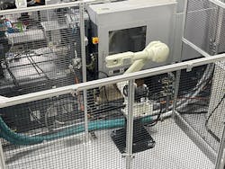 Champion Plastics added this Kawasaki RS010N A six-axis robot to tend an injection molding machine. Champion Plastics added this Kawasaki RS010N A six-axis robot to tend an injection molding machine.