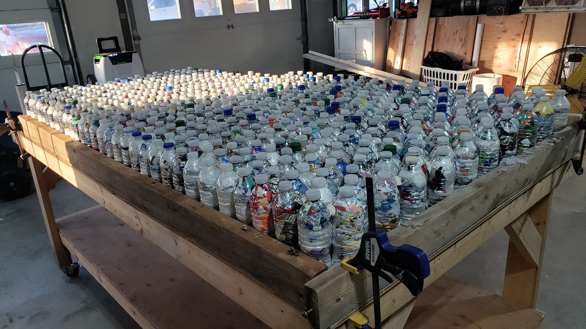 Carpenter Nathan Gray is planning to incorporate 730 ecobricks -- water bottles stuffed with soft plastics -- in each of the walls of a tiny demonstration house he's building. He believes the ecobricks could be used to provide insulation.