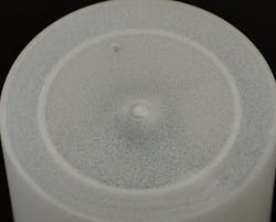 A close-up photo reveals the uniform distribution of bubbles within even very thin structures, like this cap, created with resin processed with foaming agents. A close-up photo reveals the uniform distribution of bubbles within even very thin structures, like this cap, created with resin processed with foaming agents.
