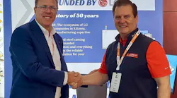 Peter Gardner, business director of LS Mtron Injection Molding Machines North America, left, poses with Mark Padgett, president of Millholland Conrad, Inc.