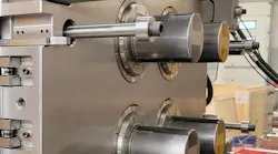 StackTeck developed this five-piece collapsing core system for making paint cans.