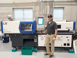RJG lab technician Brad Harvey poses in front of a new LS Mtron machine that was recently installed at Rowan-Cabarrus Community College. RJG lab technician Brad Harvey poses in front of a new LS Mtron machine that was recently installed at Rowan-Cabarrus Community College.