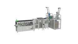 Delta Engineering's DSC500 (center) applies a coating only on the outside of preforms, rather than both the interior and exterior of preforms.