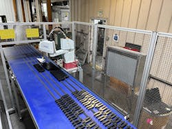 An Epson robot has proved a cost-effective solution for Plastics Designs Inc., which was seeking an efficient, more-accurate way to stack and package shims used in window and door installations. An Epson robot has proved a cost-effective solution for Plastics Designs Inc., which was seeking an efficient, more-accurate way to stack and package shims used in window and door installations.