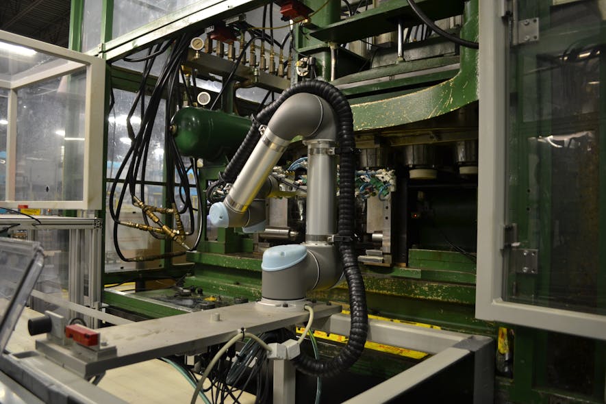 The market for cobots is hot. Here, one operates as part of an automation cell designed by integrator Onexia.