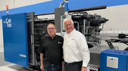 Paul Caprio, right, poses in front of an injection molding machine with Chris Evans, of Evco Plastics, a DeForest, Wis. The two men had a meeting at the Wood Dale, Ill., technical center of LS Injection Molding Machine North America. Paul Caprio, right, poses in front of an injection molding machine with Chris Evans, of Evco Plastics, a DeForest, Wis. The two men had a meeting at the Wood Dale, Ill., technical center of LS Injection Molding Machine North America.