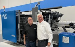 Paul Caprio, right, poses in front of an injection molding machine with Chris Evans, of Evco Plastics, a DeForest, Wis. The two men had a meeting at the Wood Dale, Ill., technical center of LS Injection Molding Machine North America. Paul Caprio, right, poses in front of an injection molding machine with Chris Evans, of Evco Plastics, a DeForest, Wis. The two men had a meeting at the Wood Dale, Ill., technical center of LS Injection Molding Machine North America.