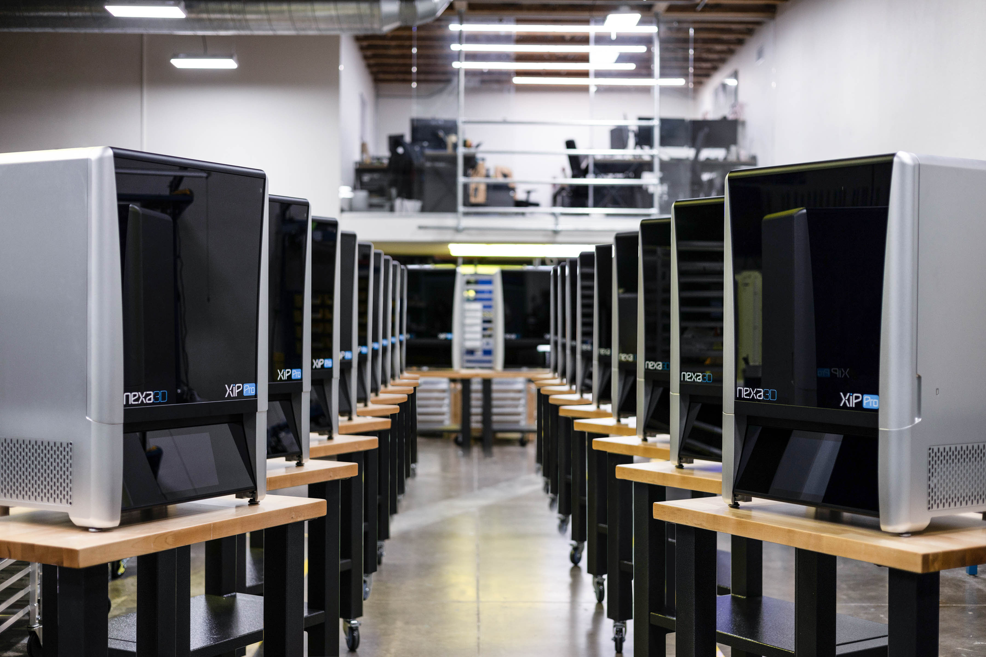 Nexa3D has designed its new Xip Pro 3D printers so that they can work in conjunction with each other and automation, enabling manufacturers to manage multiple builds at once.