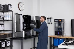 An employee works with one of Nexa3D's new Xip Pro 3D printer. An employee works with one of Nexa3D's new Xip Pro 3D printer.