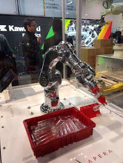 A Kawasaki MC-series robot uses an Apera AI vision system to take plastic test tubes from a bin and place them in a fixture. A Kawasaki MC-series robot uses an Apera AI vision system to take plastic test tubes from a bin and place them in a fixture.