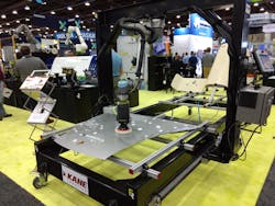 At Automate Show 2023, Kane Robotics displayed its Grit XL system, shown here polishing an automobile hood. The system can handle parts measuring up to 6 feet by 15 feet.