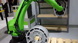 A Fanuc CR-35iB cobot takes 110-pound loads off a pallet in May at Automate.