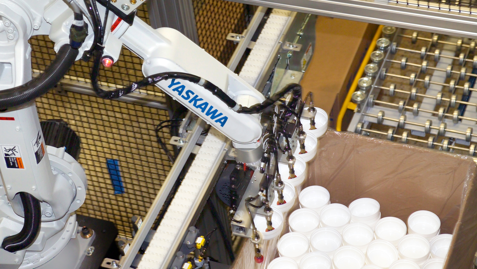 With the labor market tight, manufacturers are increasingly turning to automation, like this Yaskawa robot, to add speed, flexibility and consistency to secondary packaging applications, such as case packing of plastic components.