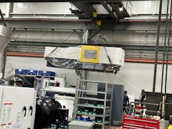 A 60-ton crane moves an injection molding machine at the Batavia, Ohio, facility of Milacron, where dozens of processing machines are currently under construction. A 60-ton crane moves an injection molding machine at the Batavia, Ohio, facility of Milacron, where dozens of processing machines are currently under construction.