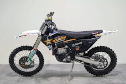 KTM Technologies, a Salzburg, Austria, maker of innovative vehicle parts, has partnered with Engel Austria GmbH to develop a process for manufacturing motorcycle seat bases that are rigid but compact. KTM Technologies, a Salzburg, Austria, maker of innovative vehicle parts, has partnered with Engel Austria GmbH to develop a process for manufacturing motorcycle seat bases that are rigid but compact.