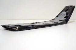 Using a new composite tape sandwich process, KTM Technologies and Engel Austria GmbH can produce motorcycle seat bases using less material and energy than traditional injection molding processes. Using a new composite tape sandwich process, KTM Technologies and Engel Austria GmbH can produce motorcycle seat bases using less material and energy than traditional injection molding processes.