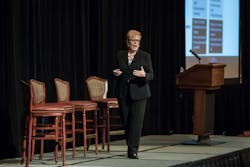 Manufacturing consultant Laurie Harbour delivers a presentation. Manufacturing consultant Laurie Harbour delivers a presentation.