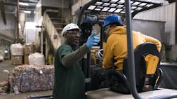 Lead tech Tommy Phillips talks to a colleague at Placon in Madison, Wis., which is among the recycling facilities spotlighted in a series of videos produced by the Plastics Industry Association showcasing the benefits of recycling. Lead tech Tommy Phillips talks to a colleague at Placon in Madison, Wis., which is among the recycling facilities spotlighted in a series of videos produced by the Plastics Industry Association showcasing the benefits of recycling.