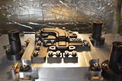 Viking Plastics makes automotive components such as this glass-filled nylon part for electric vehicles. Viking Plastics makes automotive components such as this glass-filled nylon part for electric vehicles.