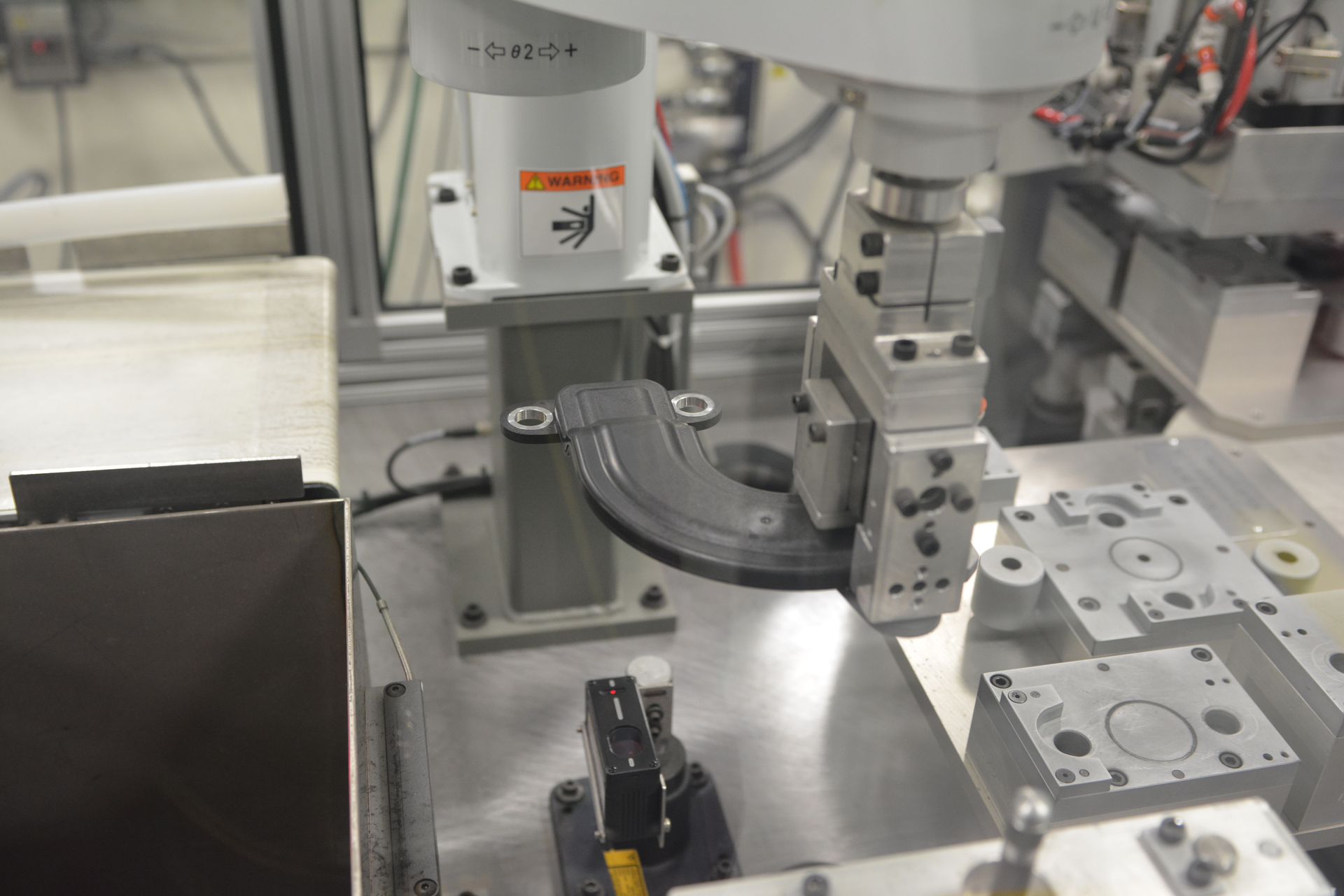 Viking Plastics makes automotive components such as this glass-filled nylon part for electric vehicles.