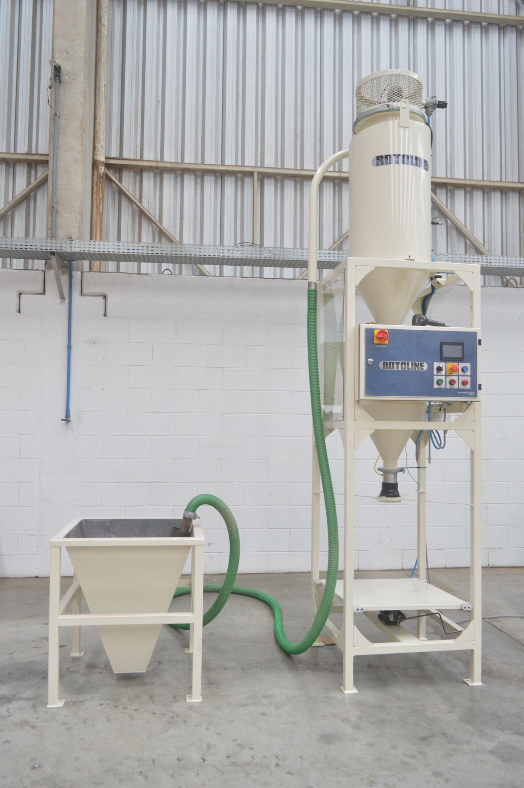 Rotoline's Automatic Weighing System weighs and dispenses precise batches into a container to match the requirements of the mold.