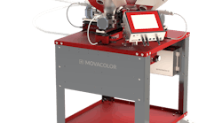 The Movacolor Off-line dosing unit is placed on a trolley next to large processing machines.