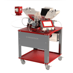The Movacolor Off-line dosing unit is placed on a trolley next to large processing machines. The Movacolor Off-line dosing unit is placed on a trolley next to large processing machines.
