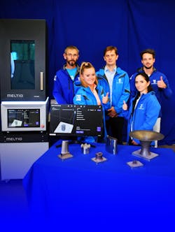 Meltio, the Linares, Spain-based manufacturer of wirelaser metal deposition 3D printers, announced it has named Büttner Ltd. its first official sales partner in Hungary. The Büttner additive manufacturing team in Hungary stands with samples of parts created by a Meltio printer. Meltio, the Linares, Spain-based manufacturer of wirelaser metal deposition 3D printers, announced it has named Büttner Ltd. its first official sales partner in Hungary. The Büttner additive manufacturing team in Hungary stands with samples of parts created by a Meltio printer.