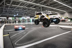 Students race their radio-controlled cars on an indoor track on the exhibit hall floor during the The Society of Plastics Engineers (SPE) Thermoforming Division&apos;s conference in October.