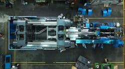 An aerial view of an injection molding machine under construction in LS Mtron's South Korea factory. An aerial view of an injection molding machine under construction in LS Mtron's South Korea factory.
