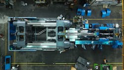 An aerial view of an injection molding machine under construction in LS Mtron's South Korea factory. An aerial view of an injection molding machine under construction in LS Mtron's South Korea factory.