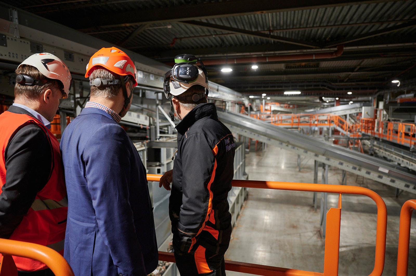 People tour the new Site Zero recycling facility in Motala, Sweden,